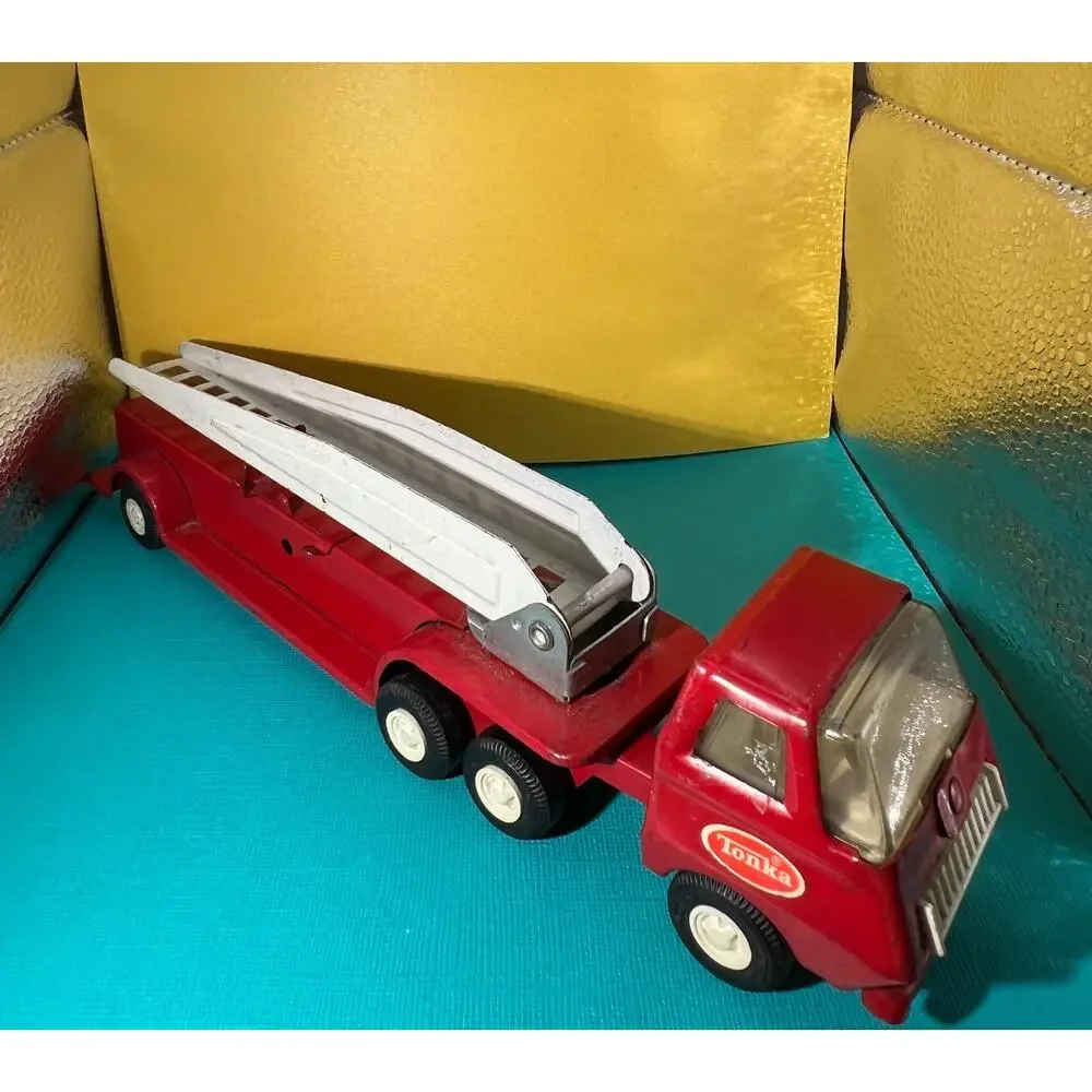 Lot of 2: One Tonka Swivel Fire Ladder Truck 1 Tootsie Toy Fire Equipment Truck